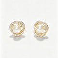Pearl Crystal Swirl Stud Earrings in gold tone with freshwater pearl center