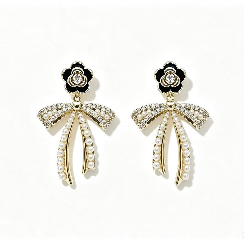 Pearl Crystal Bow Drop Earrings with black enamel flower stud and gold bow