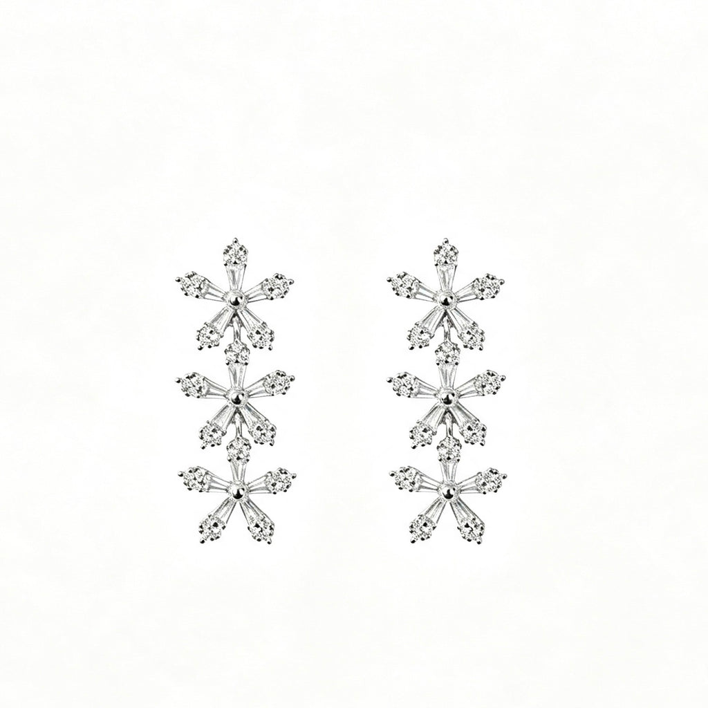 Triple Snowflake Crystal Drop Earrings in silver with baguette zirconia
