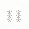 Triple Snowflake Crystal Drop Earrings in silver with baguette zirconia