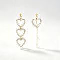 Asymmetric Triple Heart Crystal Pearl Drop Earrings with pavé hearts and pearl chain