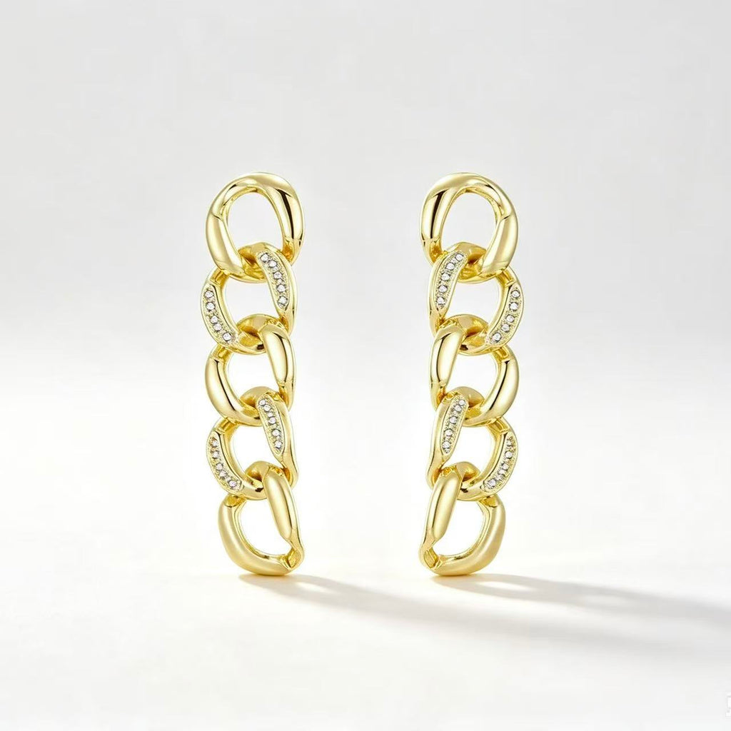 Gold tone curb chain link drop earrings with crystal pavé accents