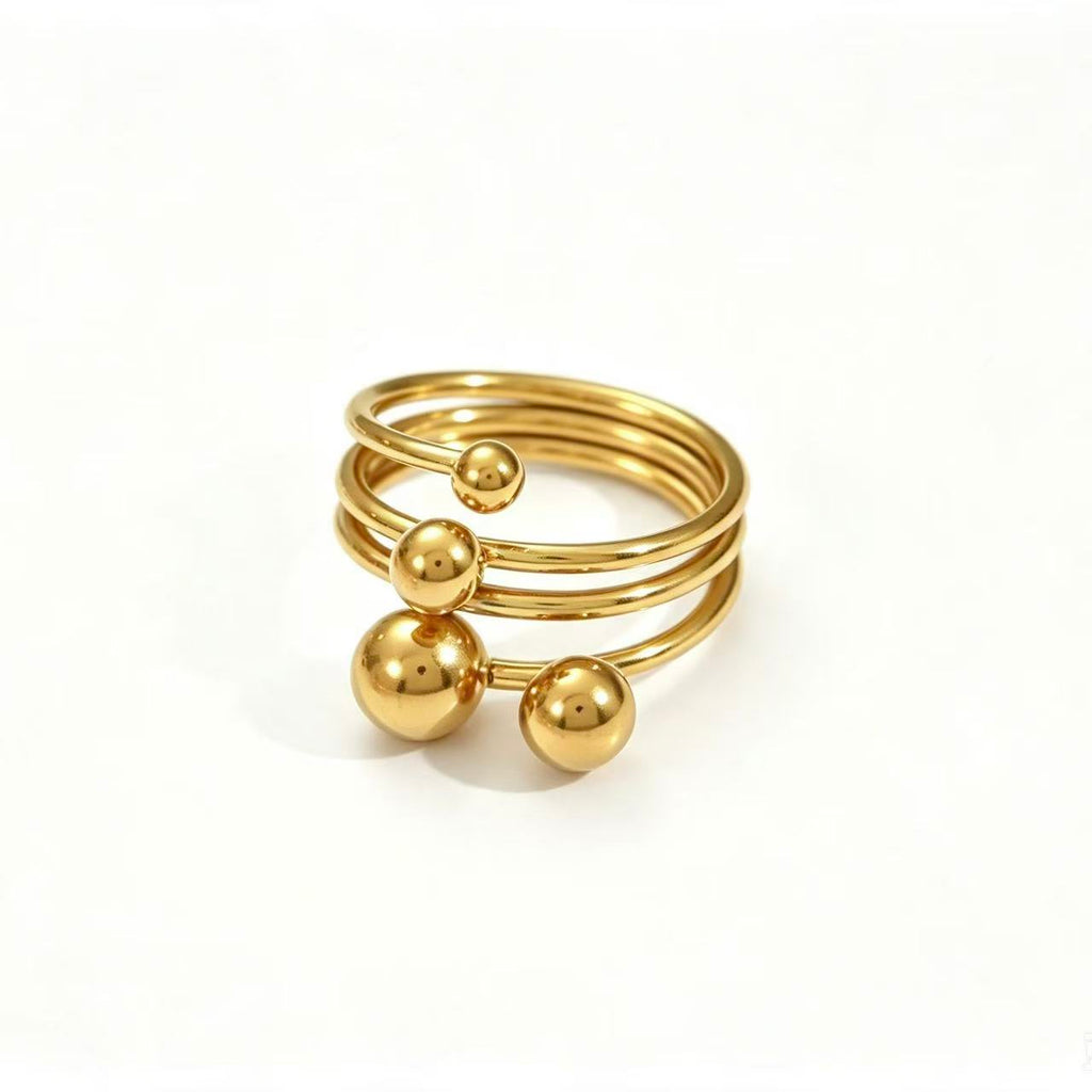 Gold Triple Spiral Ball Open Ring with graduating polished ball accents