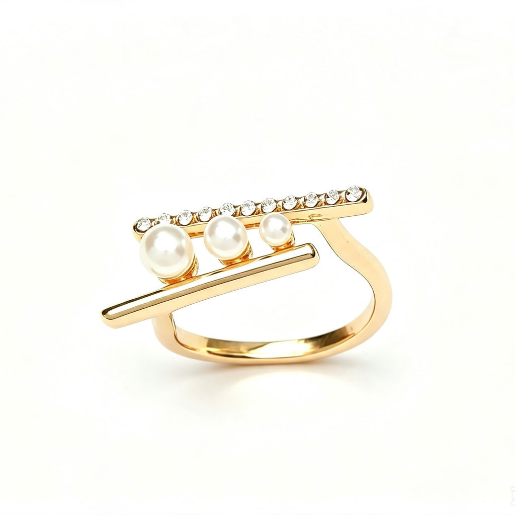 Gold double bar ring with three graduating pearls and pavé crystal top bar